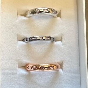 Gold and Silver Rings Set with Delicate Patterns